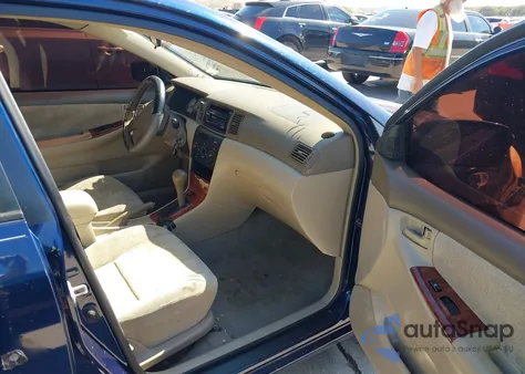 2004 Toyota Corolla Le from USA, damaged, VIN 1NXBR32E34Z289071